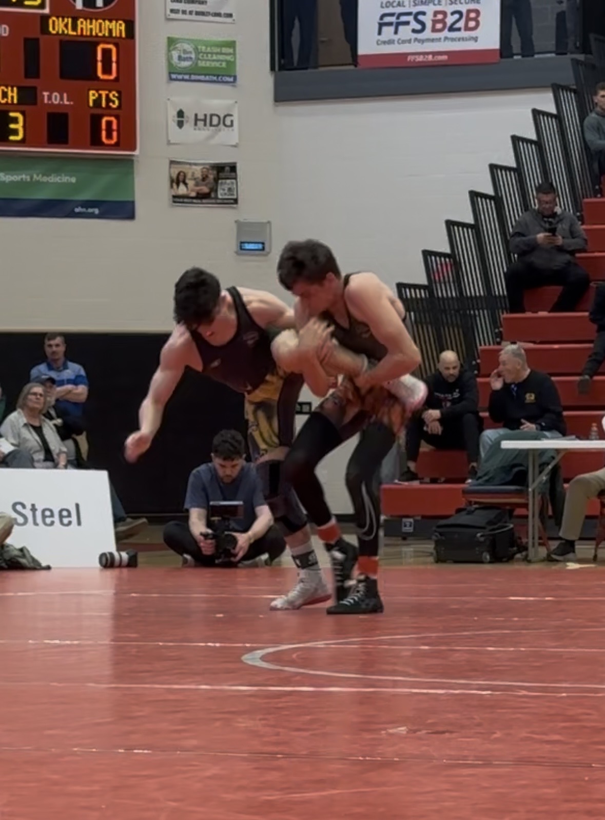Tommy Dean Miller of Marlow in on a single leg of Central Valley's Antonio Boni
