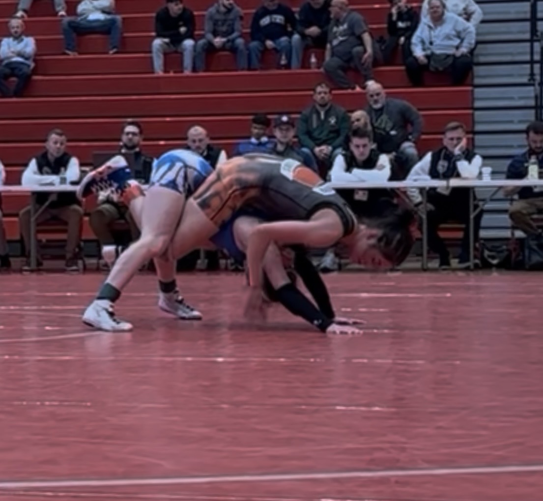 Kristen Delarosa with legs in on Daylee Watson of Conneaut, PA