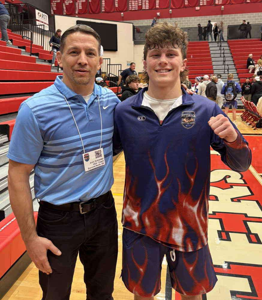 Joseph Jeter with coach Andrew Schneider.