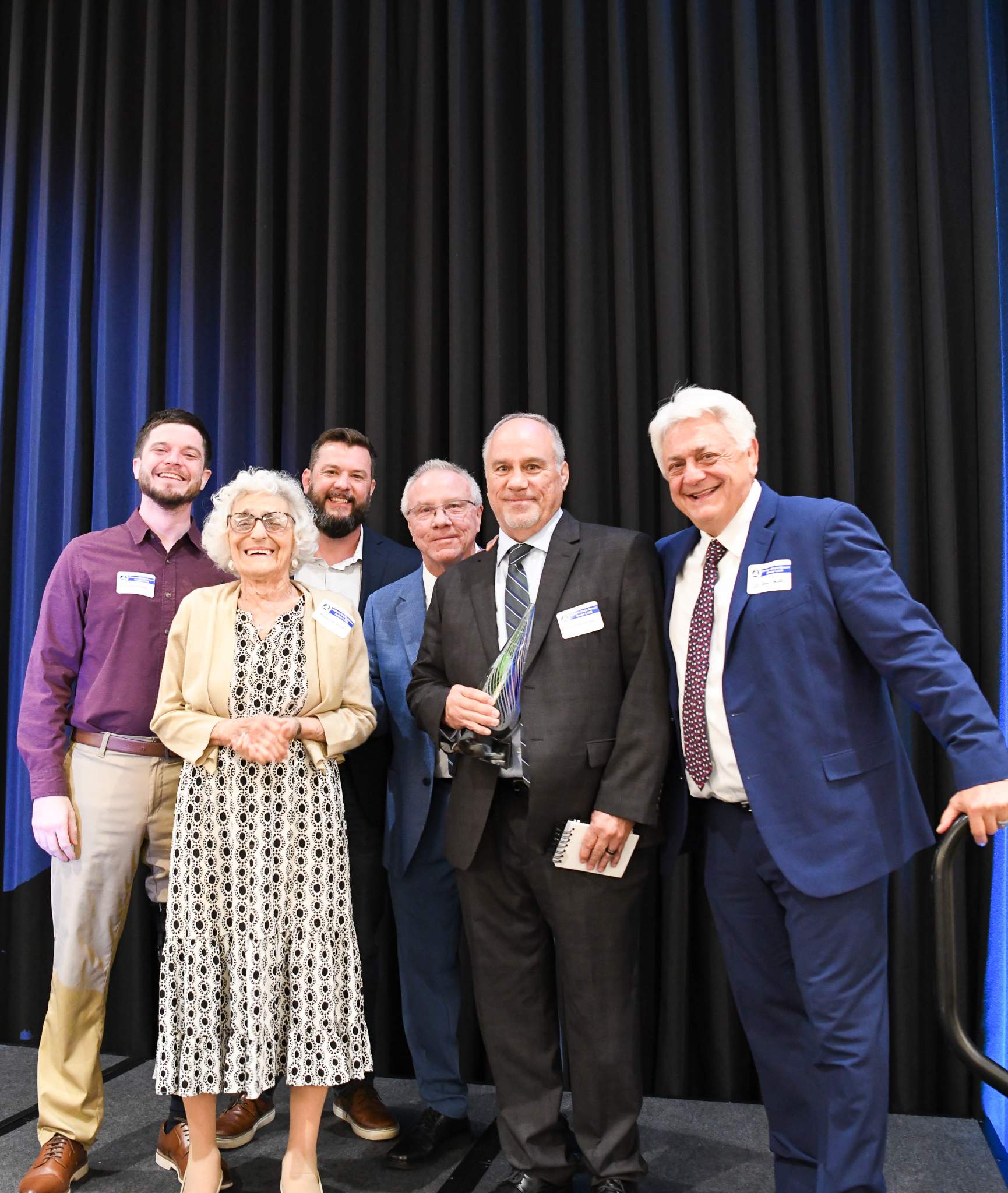 James Family receiving the Lee Roy & Madalene Smith Family Award. Pictured l to r: Cody James, Madalene Smith, Zack James, David James, Ronnie James, Lee Roy Smith, III. (Photo: Nate Gomez)
